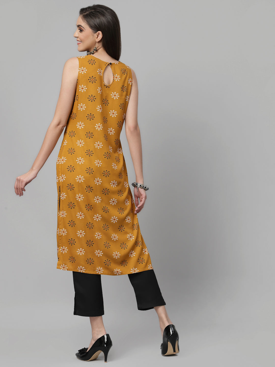 Women Mustard Printed Sleeveless Kurta - Kashyap Global Lifestyles LLP
