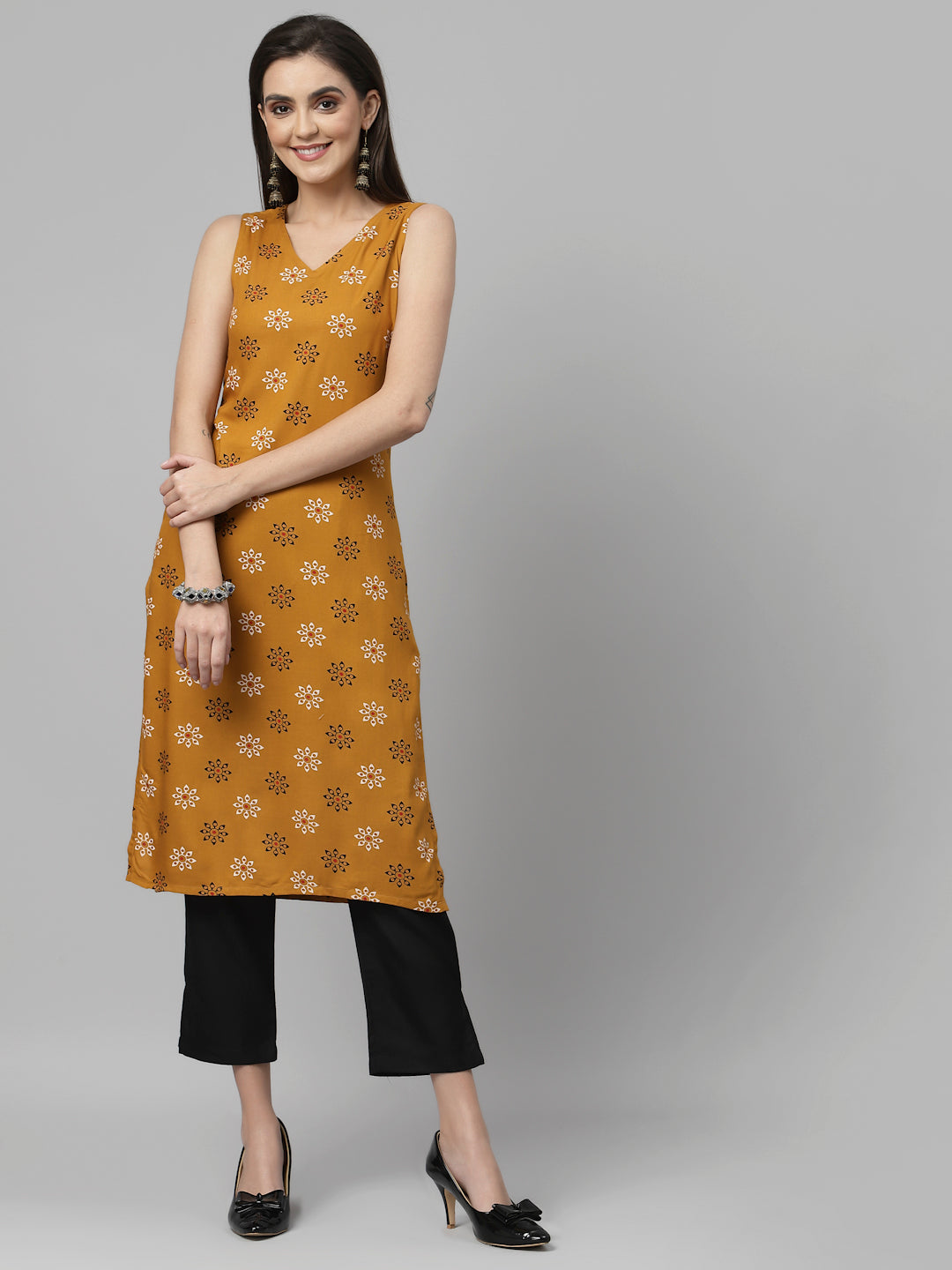 Women Mustard Printed Sleeveless Kurta - Kashyap Global Lifestyles LLP