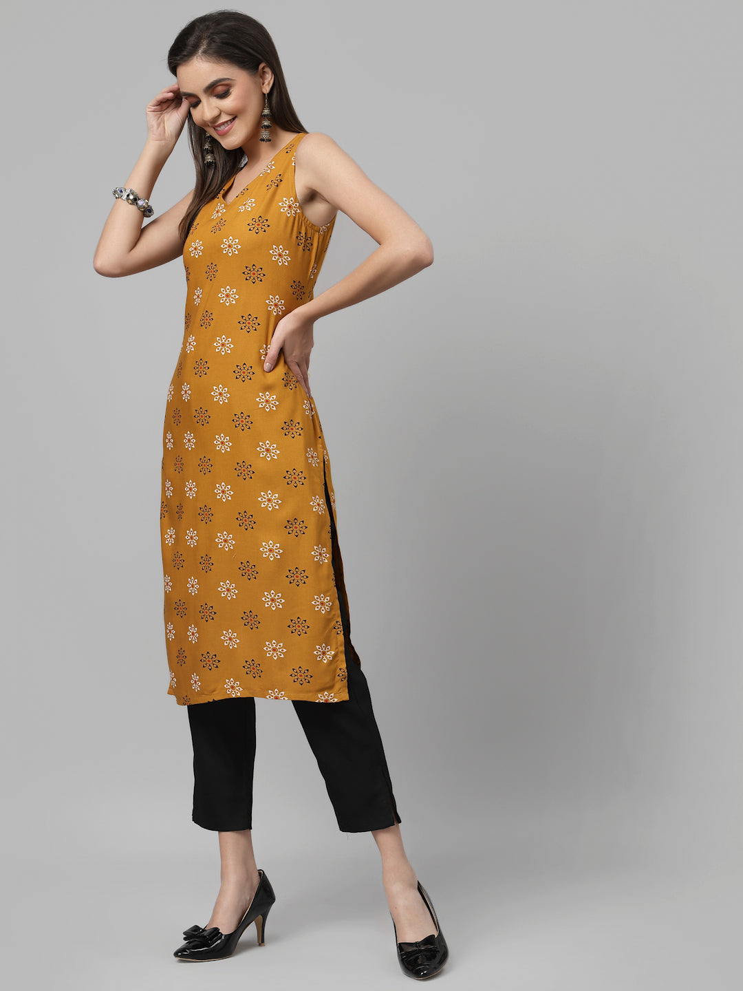 Women Mustard Printed Sleeveless Kurta - Kashyap Global Lifestyles LLP