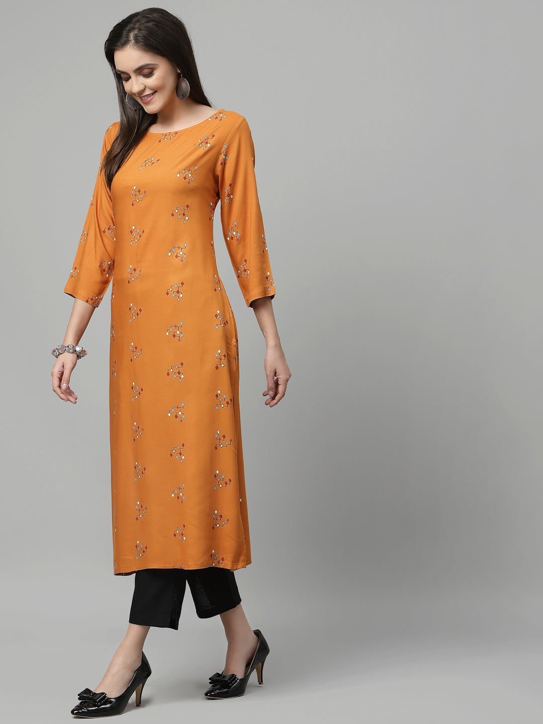 Women Orange Boat Neck Kurta - Kashyap Global Lifestyles LLP